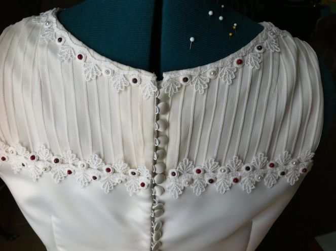 Detail of the back with beading and lace