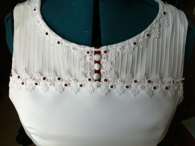 Detail of the front with beading and lace